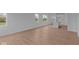 Bright living space showcasing light wood flooring and an open floor plan at 5211 Rolling Meadow Blvd, Indianapolis, IN 46237