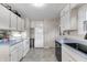 Functional kitchen with white appliances and ample cabinet space at 5225 S Linwood Ave, Indianapolis, IN 46237