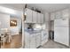 Efficient kitchen space offering ample cabinet and appliance area and adjacent breakfast nook at 5225 S Linwood Ave, Indianapolis, IN 46237