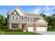 Inviting two-story home with a brick facade, two-car garage, and manicured landscaping at 5279 Pelion Pl, McCordsville, IN 46055