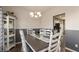 Dining room with gray and white accents and a view of the kitchen at 5607 Regency Dr, Columbus, IN 47203