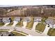Aerial view of a neighborhood with well-maintained lawns at 5658 Pecan Ct, Noblesville, IN 46062