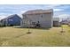 Back of home featuring a well manicured lawn at 5658 Pecan Ct, Noblesville, IN 46062