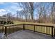 Backyard featuring a wood deck and mature trees at 5658 Pecan Ct, Noblesville, IN 46062