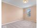 A vacant, carpeted bedroom with neutral walls and base molding, ready for personalization at 5658 Pecan Ct, Noblesville, IN 46062