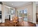 Bright breakfast nook with a view of the deck and access to the modern kitchen at 5658 Pecan Ct, Noblesville, IN 46062