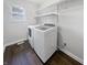 Laundry room features a washer, dryer, and shelving at 603 Raintree Dr, Avon, IN 46123