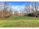 Spacious fenced in backyard with a small storage shed at 7023 Mustang Ct, Martinsville, IN 46151
