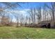 Large backyard with picnic table, storage shed, and a blue ball at 7023 Mustang Ct, Martinsville, IN 46151