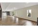 Spacious basement featuring wood flooring, recessed lighting, and large sliding glass doors for ample natural light at 7023 Mustang Ct, Martinsville, IN 46151