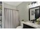 Bright bathroom featuring a shower, vanity, framed mirror, and decor at 7023 Mustang Ct, Martinsville, IN 46151