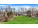 Charming brick home featuring a large lawn and inviting, shaded, walk-out balconies on both stories at 7023 Mustang Ct, Martinsville, IN 46151