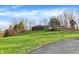 Spacious two-story home set on a beautiful lot with mature trees and lush greenery at 7023 Mustang Ct, Martinsville, IN 46151