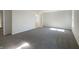 Large primary bedroom featuring neutral carpeting, natural light and access to the ensuite bathroom at 733 Keepsake Run, Greenwood, IN 46143