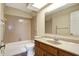 Functional bathroom featuring a shower-tub combo, a sink, and essential fixtures at 7607 Farm View E Cir, Indianapolis, IN 46256
