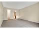 Spacious bedroom offers versatility, leading to a closet and a full bathroom at 7607 Farm View E Cir, Indianapolis, IN 46256