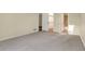 Bedroom features carpeted floors, closet, and bathroom with a shower-tub combo at 7607 Farm View E Cir, Indianapolis, IN 46256