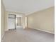 Spacious bedroom featuring neutral carpeting, baseboard trim, and a mirrored closet at 7607 Farm View E Cir, Indianapolis, IN 46256