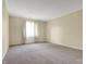Expansive bedroom with neutral carpet and natural light from the bright window at 7607 Farm View E Cir, Indianapolis, IN 46256