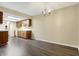 An open-concept Kitchen with wood cabinets at 7607 Farm View E Cir, Indianapolis, IN 46256