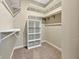 Walk-in closet featuring built-in shelving for optimal storage at 943 Foxglove St, Lebanon, IN 46052