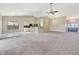 Bright, open-concept living room featuring a breakfast bar, and ample natural light from a window at 943 Foxglove St, Lebanon, IN 46052