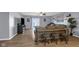 Modern living area with hardwood floors, stylish decor, and easy access to the outdoor patio at 972 Redwood Dr, Franklin, IN 46131