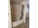 Bathroom featuring a tub and shower combination with a shower curtain at 10072 Graceful Landing Dr, Indianapolis, IN 46234
