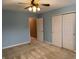 Bedroom featuring carpet flooring, a ceiling fan, and closet at 10072 Graceful Landing Dr, Indianapolis, IN 46234