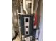 Furnace with visible labels and piping in a utility space at 10072 Graceful Landing Dr, Indianapolis, IN 46234
