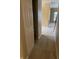 Hallway view showcasing fresh paint and access to other rooms at 10072 Graceful Landing Dr, Indianapolis, IN 46234