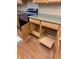 Kitchen cabinet with convenient pull-out drawer feature next to oven at 10072 Graceful Landing Dr, Indianapolis, IN 46234