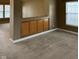 View of cozy living room featuring neutral walls and built in cabinets at 10072 Graceful Landing Dr, Indianapolis, IN 46234