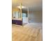 Living room with open access to the foyer and dining room, enhancing the flow between spaces at 10072 Graceful Landing Dr, Indianapolis, IN 46234