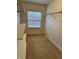 Bright walk-in closet with shelving and natural light at 10072 Graceful Landing Dr, Indianapolis, IN 46234