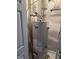 Bradford White hot water heater with copper piping and yellow gas line at 10072 Graceful Landing Dr, Indianapolis, IN 46234