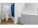 Bright bathroom with updated vanity, modern fixtures, and a shower/tub combo at 1114 S Avon Ave, Avon, IN 46123
