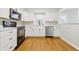 Newly renovated kitchen with white cabinetry, stainless steel appliances, and plenty of counter space at 1114 S Avon Ave, Avon, IN 46123