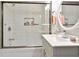 Modern bathroom with white subway tile shower, glass door, vanity, and updated fixtures at 118 W Fordice St, Lebanon, IN 46052