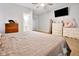 This primary bedroom features neutral tones, carpet, ensuite bathroom, and lots of natural light at 118 W Fordice St, Lebanon, IN 46052