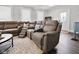 Cozy living room showcasing a large sectional sofa, neutral rug, and lots of seating at 118 W Fordice St, Lebanon, IN 46052