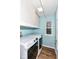 Laundry room with a white washer and dryer and a window for natural light at 12527 Trester Ln, Fishers, IN 46038