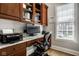 Functional home office with custom cabinets, granite countertops, and natural light at 12897 Queens Troop, Carmel, IN 46032