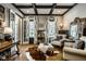 Elegant home office with French doors, decorative accents, and ample seating at 12897 Queens Troop, Carmel, IN 46032