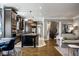Open floor plan showing kitchen with an island, breakfast nook and view to the living room at 12897 Queens Troop, Carmel, IN 46032