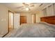 Comfortable bedroom featuring a ceiling fan, closet, and an en-suite bathroom at 140 Kim Dr, Anderson, IN 46012