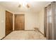 Bedroom featuring a neutral carpet, chair, and closet perfect for a cozy atmosphere at 140 Kim Dr, Anderson, IN 46012