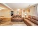 Inviting living room featuring comfortable seating, wood-look flooring, and neutral decor at 140 Kim Dr, Anderson, IN 46012