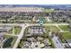 An aerial view showcasing the community's layout, landscaping, and surrounding neighborhood at 1561 Brookfield Cir, Franklin, IN 46131