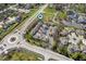 An aerial view showcasing the community's street layout, landscaping, and surrounding neighborhood at 1561 Brookfield Cir, Franklin, IN 46131